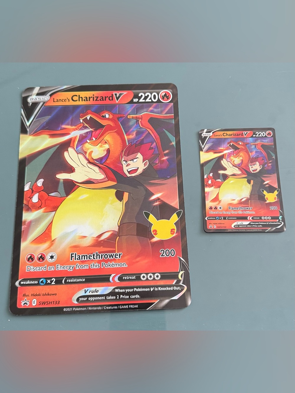 Lance’s Charizard V Promo Jumbo & standard size Cards SWSH133